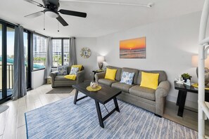 Large family room with queen and twin pullout couches.