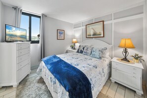 Queen bed in private bedroom.