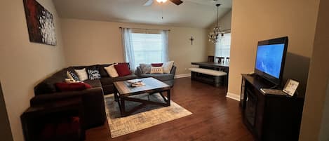 Living Room - we have board games, puzzles, and books, and a 50 inch Roku TV