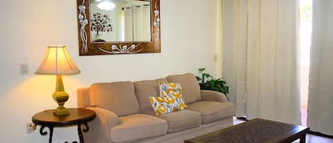 Comfortable living room with pool view