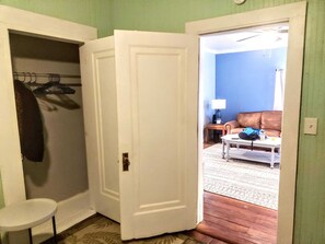 Front bedroom closet looking into living room