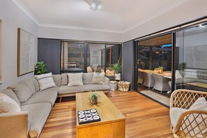 View from the Sitting Room to the Outdoor Pool & BBQ area