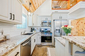 Fabulous updated kitchen with modern appliances and ample counter space.