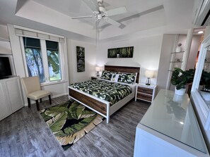 Snuggle down and watch your favorite movie on your bedroom flat screen TV