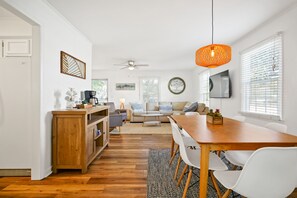 Light, airy, and open dining and living area.