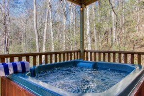 Soak up this private jacuzzi under romantic party lights on back deck off Master