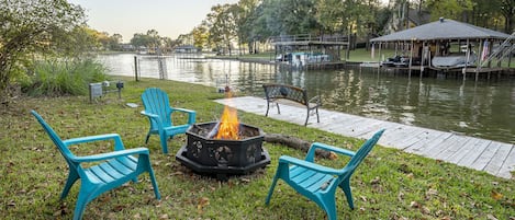 Gather around the fire pit and enjoy the lake views!