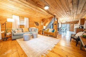 Cozy furniture, blankets and pillows await you!