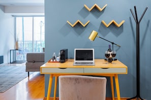 Work comfortably with a dedicated desk and chair.