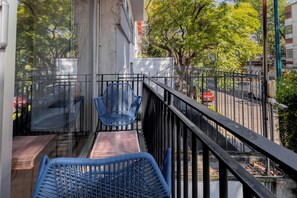 Wake up to stunning city views from your private balcony.