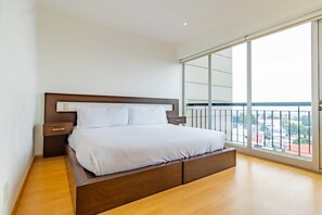 A space with large windows that offer spectacular views