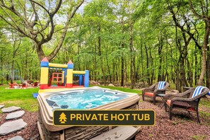 Relax in the hot tub, make s'mores, bounce in the bouncy house, or all 3 at once!