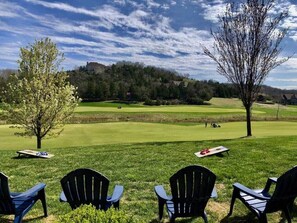 Backyard on the 14th fairway w/ room for games, just steps away on 14th fairway, 8 adirondack chairs