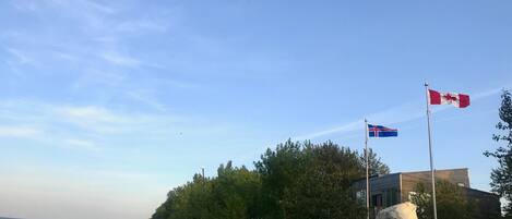 In summer, flags fly at a memorial to Icelandic settlers (right next door). 