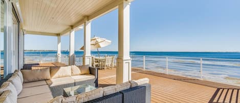 A comfortable furnished first deck with scenic views.