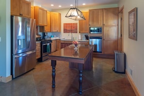 Fully equipped kitchen opens to Great Room so everyone can interact.