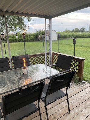 expand the fun to the cover deck-patio! Seating for 6, Bike Rack, Pit Boss