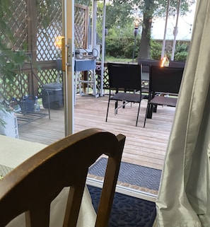 Easy in and out to the patio-deck area from the kitchen-dining area.