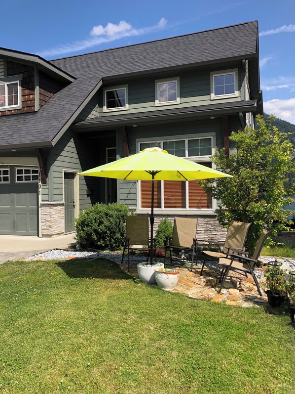 Relax and unwind on our patio overlooking the front garden and nearby mountains