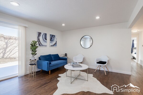 The upstairs living room is perfect for relaxing or winding down with your favorite new book.