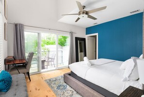 Enter our master suite, with a walk-out balcony overlooking the beautiful back patio and lounging area.