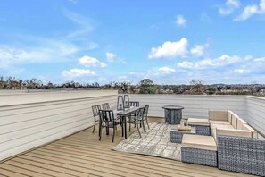 Kick back on our rooftop lounge offering: -gas fire pit-sectional couch-dining table-BBQ grill