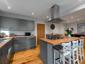 Cabinetry, Furniture, Countertop, Kitchen Appliance, Table, Kitchen Stove, Kitchen, Home Appliance, Wood, Chair