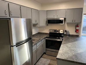 Stainless steel appliances, and full kitchen 