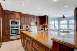 Chefs Kitchen with exquisite granite 