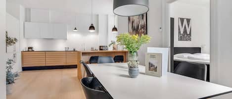 Dining area - Please note that we have 4 apartments, they differ in design but have the same layout and are overall identical in quality level. The apartments are located from the 1st to 5th floor.