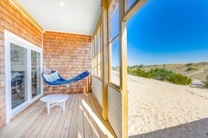 Lounge in the hammock taking in salty ocean breezes and stunning views