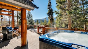 Hot tub with gas grill and outdoor seating