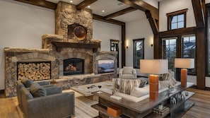 Great room with TV and fireplace