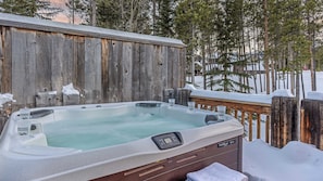Private hot tub off the upper level primary suite