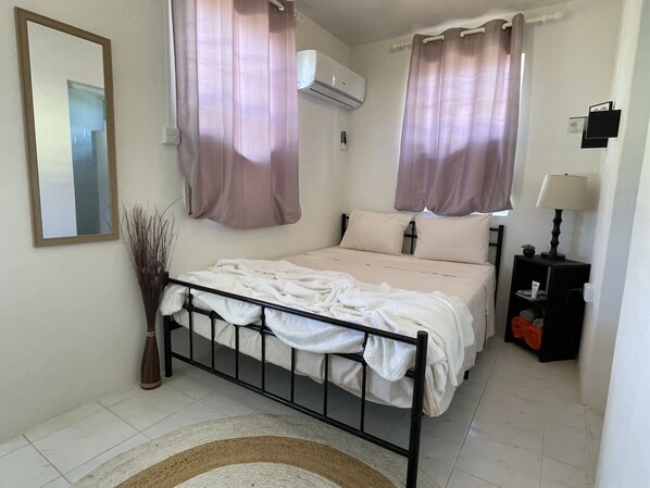 Cozy One Bed Apartment fully equipped 
with AC/Ceiling fans modern furniture.