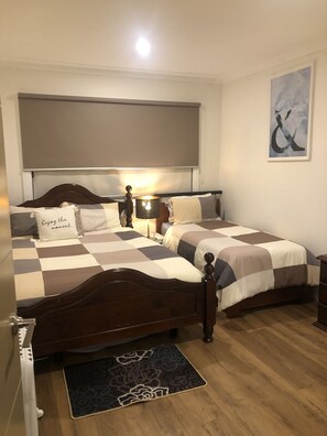 Queen Bed and A Single Bed in the master bedroom