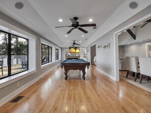 Pool table, lake view, stool seating, tv