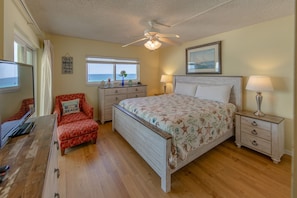 Gulf front master bedroom with a king size bed.