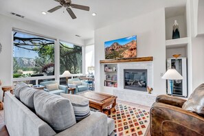 Comfortable Living Room with a TV and Gas Fireplace