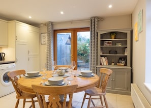 Large dining table in the spacious kitchen.