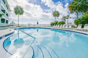 This idyllic pool situated directly across the street from the Gulf of Mexico. The location offers panoramic sunset views, while the warm breezes from the nearby ocean add to the natural beauty and serenity of this wonderful place