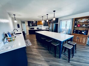 Large modern kitchen with two dishwashers.