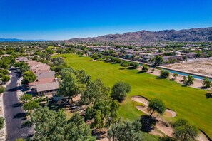 Golf front home with hiking trails nearby.