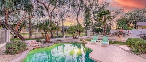 Relaxing pool with stunning views and waterfall feature!