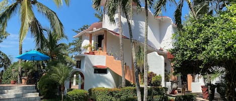 View of Casa from street entry (property is securely fenced and gated)