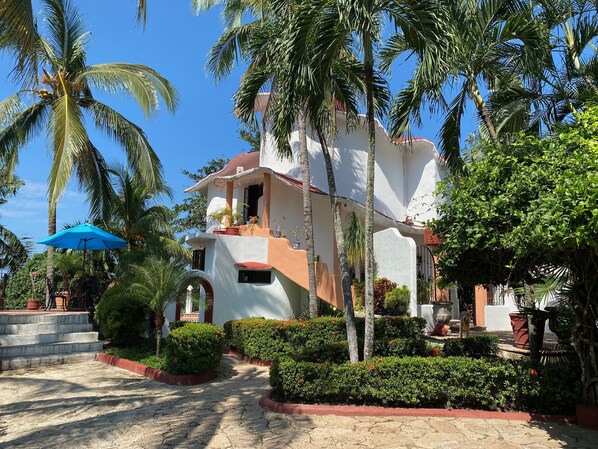 View of Casa from street entry (property is securely fenced and gated)