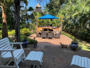 patio and barbeque area next to casa