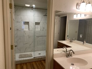 Upgrated, luxury spacious master bedroom shower appointed for two. Very private. Three doors deep.
