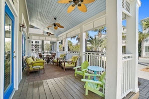 Front porch for relaxing and cocktail hour.