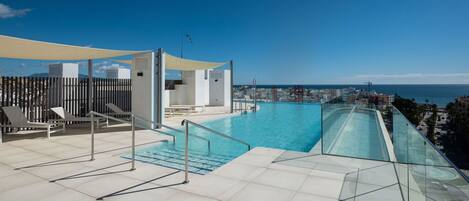 Sky, Water, Building, Swimming Pool, Azure, House, Shade, Outdoor Furniture, Urban Design, Condominium